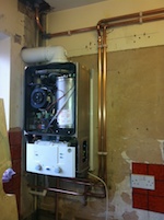 gas boiler with its front cover removed