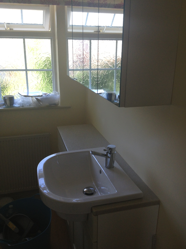 white sink with mixer tap